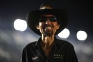 NASCAR Hall of Famer and team owner Richard Petty walks the grid the NASCAR Craftsman Truck Series NextEra Energy 250 - Source: Getty